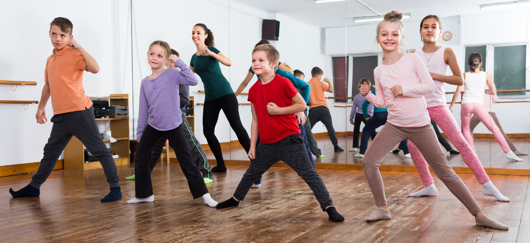 Cheerful children studying contemp dance